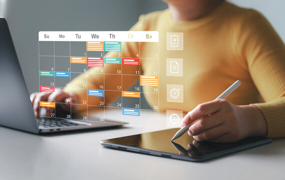 Businesswoman, Entrepreneur, Business Planning and Scheduling, Planner on Screen with People Working at Desk, Businessman Planning and Scheduling Meeting