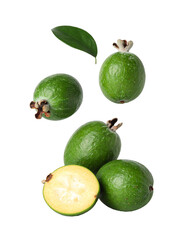 Whole and halved feijoa fruit isolated on black background