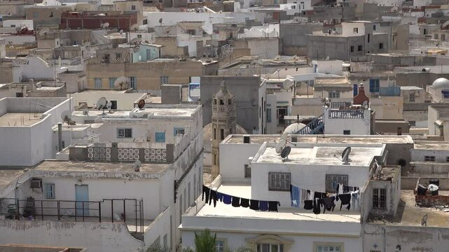 Drying laundry on rooftop of historic building in old medina of Sousse in Tunisia
