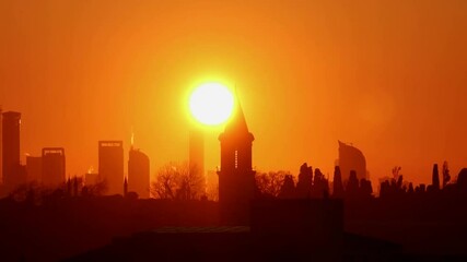 The scorching sun in the city on a day of extreme heat, the product of a heat wave caused by climate change.
