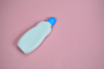 Cosmetic tube, Blank Cosmetic product branding mockup, face wash tube, cream tube Mock up isolated on pink background
