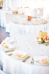 Elegant Table Setting with Floral Decorations for a Special Occasion