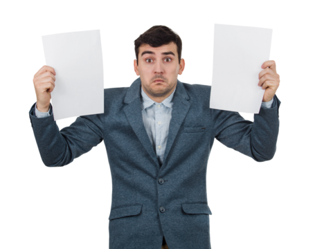 Confused young businessman holding two blank papers sheets in his hands isolated on transparent background. Human emotion, face expression life perception concept