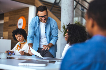 Team Members Collaborating in a Modern Office Environment