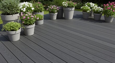 Gray Composite Deck with Potted Plants - A tranquil outdoor scene featuring a modern gray composite deck adorned with various potted flowering plants. Perfect for home improvement and landscaping proj