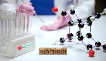Embarking on an indepth exploration of Boron within a chemistry lab using molecular models and...