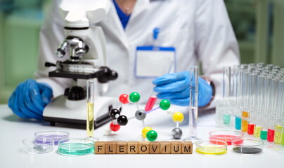 A dedicated scientist diligently works in a wellequipped lab filled with microscopes, test tubes,...