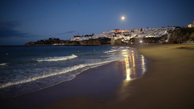 Moonlit Albufeira Beach: Coastal Paradise Under Night Sky