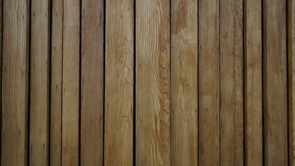 Wooden fence, background of the wall made of wooden texture. Background with wooden beams. Interior...