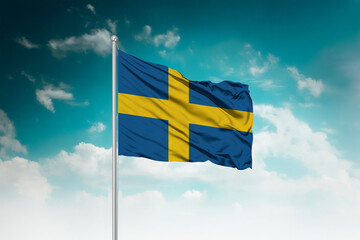 High-resolution stock image of a gently billowing Sweden national flag mounted on a modern flagpole...
