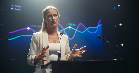 Tech Entrepreneur Talking Business Partnership and Venture Capital on Stage. Businesswoman Standing...