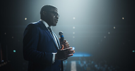 Portrait of a Charismatic Black Entrepreneur Sharing an Inspiring Talk on Technology and Leadership...
