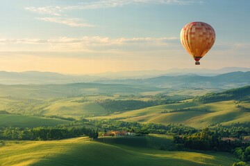 Obraz premium Balloon flying over sunny landscape