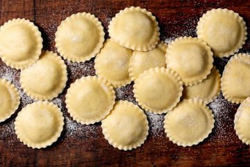 Fresh Ravioli Pasta on Wooden Board