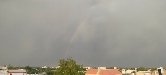 rainbow in the cloudy day.