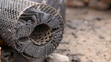 Close-up of a disassembled oil filter. Ideal for car service advertising materials, business cards.