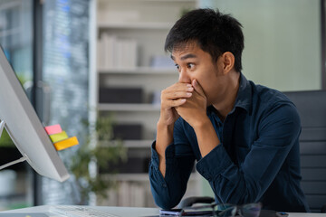 stressed asian businessman working in the office. Businessman thinking too much work concept in the...