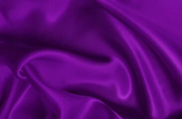Dark purple fabric texture background, detail of silk or linen pattern.