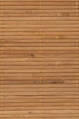 Natural light brown wooden bamboo mat background