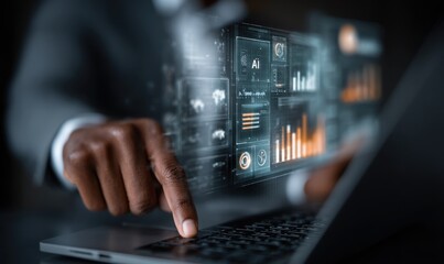 A man is using a laptop to draw a picture of a hand pointing at the letter A