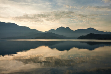 Fototapeta premium The sunrise scenery of Sun Moon Lake National Scenic Area in Nantou, Taiwan, is one of the famous attractions in Taiwan.