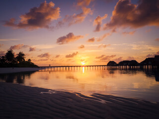 Golden Maldives Sunrise Over Sea Of Clouds And Fiery Sky Reflected On Water