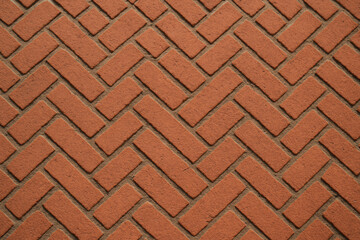 Close-up of a weathered brick wall texture.