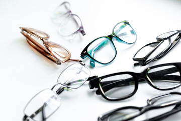 Set with different eyeglasses with lenses isolated on white