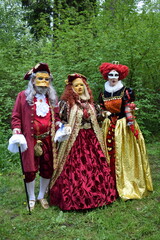 Obraz premium Three Elegant Historical Carnival Costumes