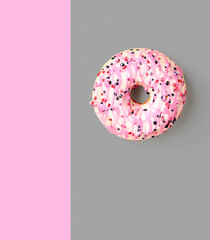 Donut photography abstract poster on grey and pink background.