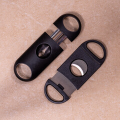 A black cigar cutter isolated placed on the table