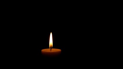 Candle Flame in Darkness &ndash; Hope and Calm
