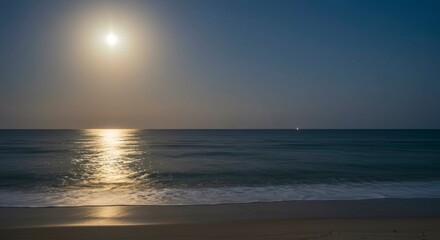 Obraz premium Serene moonlit beach scene at night, ocean waves gently lapping the shore under a bright, full moon