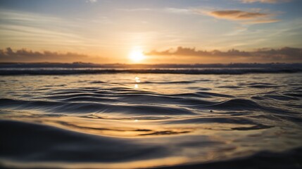 Obraz premium Tranquil ocean view with calm waves under golden sunset, minimalist seascape with copy space, conveying peace, relaxation and freedom of coastal life.