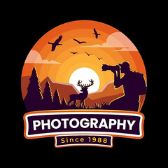 Photography logo illustrating a photographer capturing wildlife at sunset with birds and deer