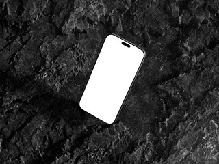 Modern smartphone with frame less blank screen on dark rock textured surface, ready for customization or design presentations.