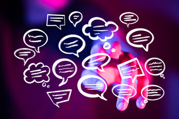 Abstract image of speech bubbles and a hand, symbolizing communication, dialogue, and connection.
