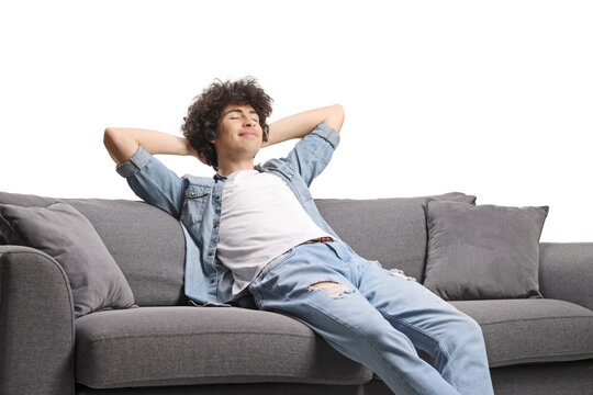 Relaxed young man enjoying on a sofa