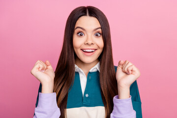 Charming Cheerful young woman with joyful expression gesturing in casual outfit on pink background