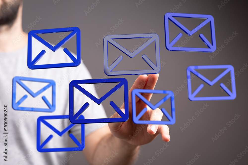 Fototapete a person interacts with floating email icons, representing inbox management and digital communicatio