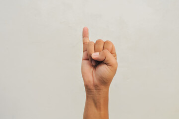 little finger gesture pointing up