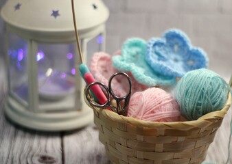 Crocheted flowers  and clews and hooks and scissors handmade decor photo 