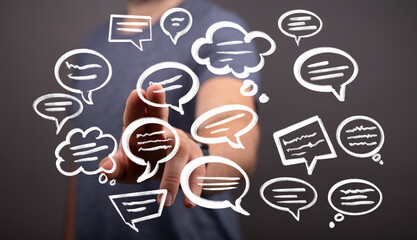 Image of a person interacting with speech bubbles, ideal for communication, social media, or teamwork concepts.