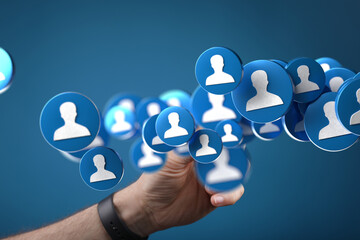 Hand interacting with digital profile icons, symbolizing social media connections and networking.
