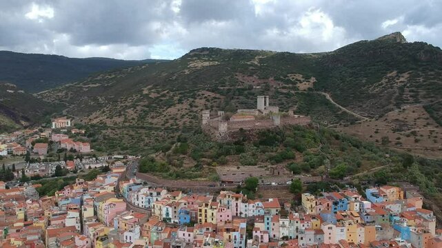 The drone view above the city of Bosa, Italy, Sardinia