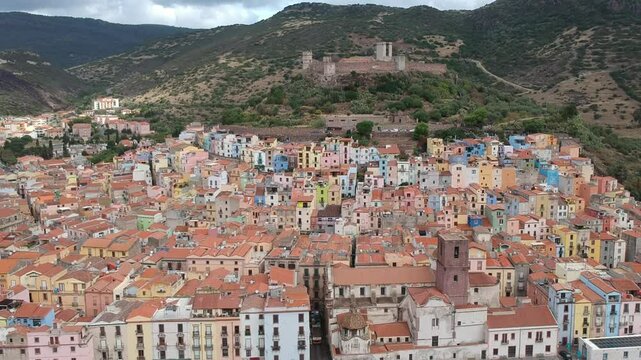 The drone view above the city of Bosa, Italy, Sardinia