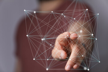 Abstract image of a hand interacting with a digital network.  Perfect for tech, connectivity, and...