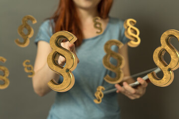 Abstract image of a woman interacting with golden paragraph symbols on a tablet, representing law,...