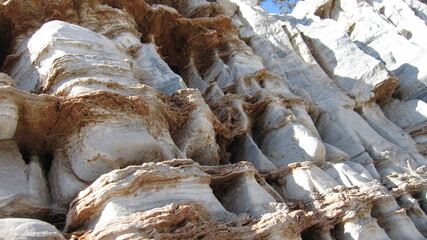 Stones with strip-shaped textures