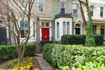 facade of a brick townhouse in downtown Washington, DC. Classic architecture of an america...